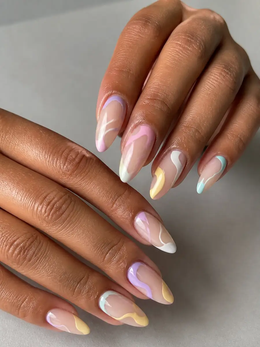 Pastel Swirl Nails: almond, abstract freehand shapes on nude base, pastel swirl