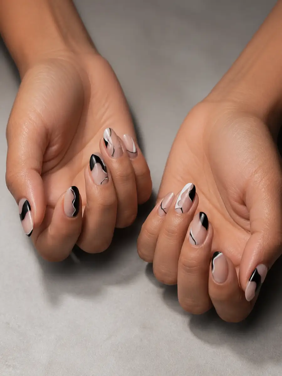 Monochrome Abstract Nails: almond, abstract freehand shapes on nude base, monochrome abstract