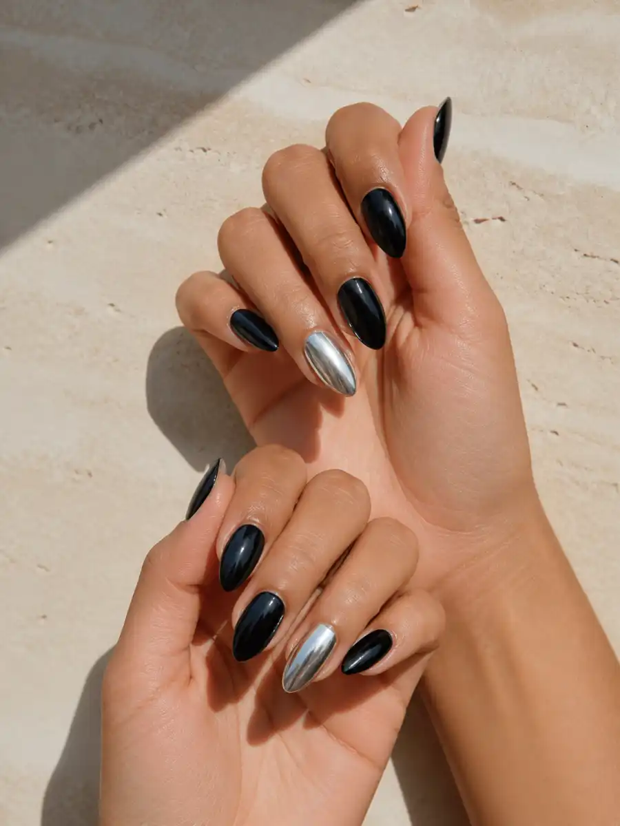 Chrome Accent Black Almond Nails: black almond, one chrome accent nail