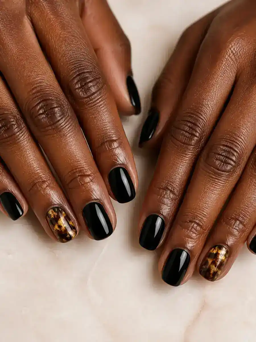 Tortoiseshell Gold Nails: black with one gold accent nail, tortoiseshell gold