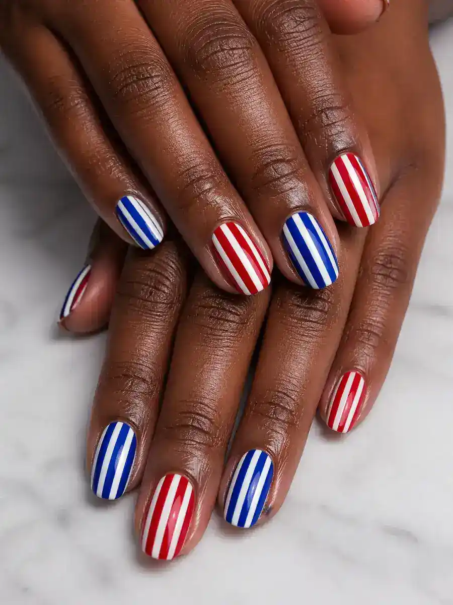 Red Stripe Nails: red, white and blue across alternating nails, red stripe