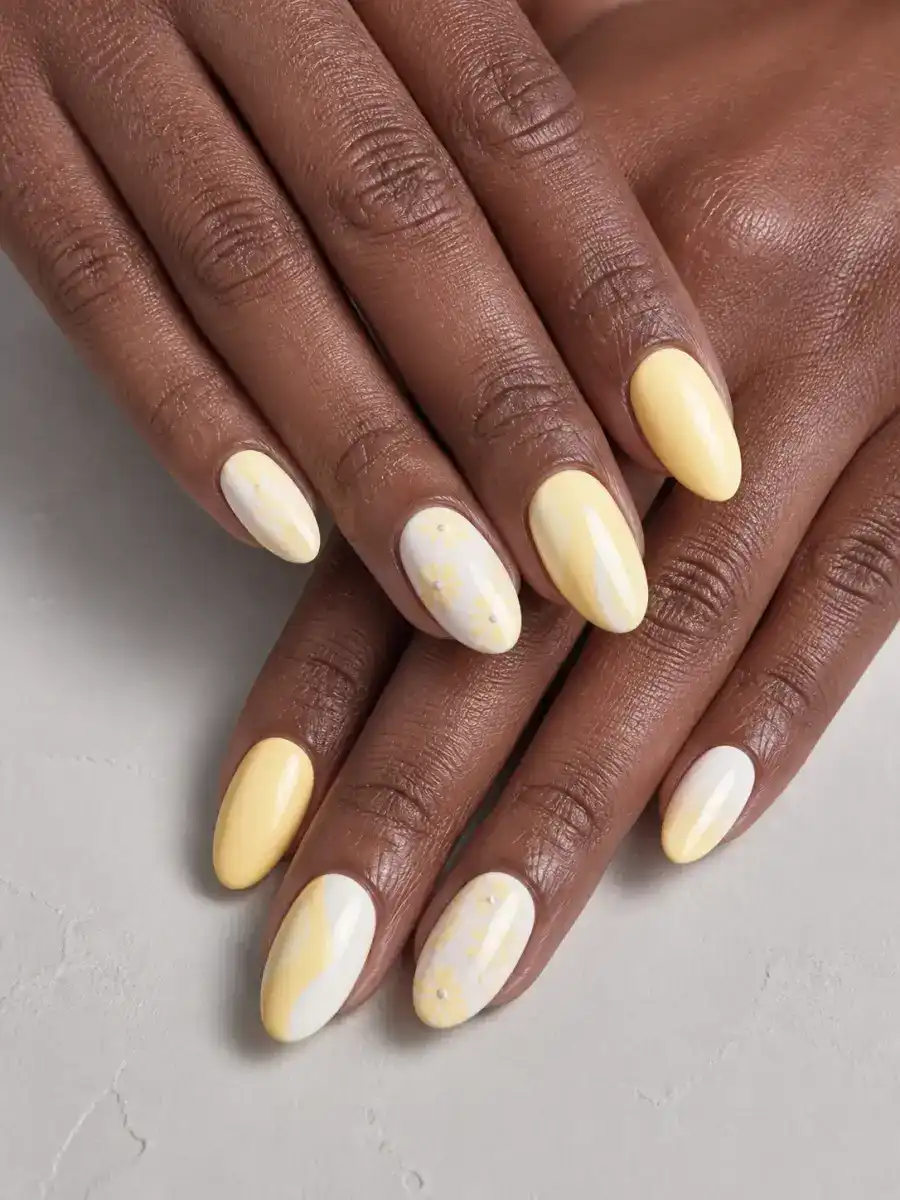 Pastel Yellow Almond Nails: butter yellow over white base, pastel yellow almond
